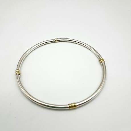 Esclava de plata 925 y double en oro 18 ktes. Esclava de plata 925 y double en oro 18 ktes.