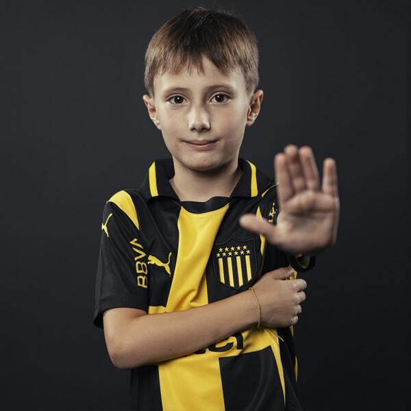 PEÑAROL JERSEY JR 2025 - PUMA AMARILLO/NEGRO
