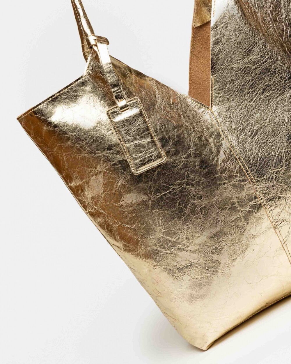 Bolso Loto en cuero metalizado Platino