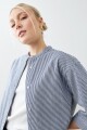 Camisa rayada de jean cuello mao crudo
