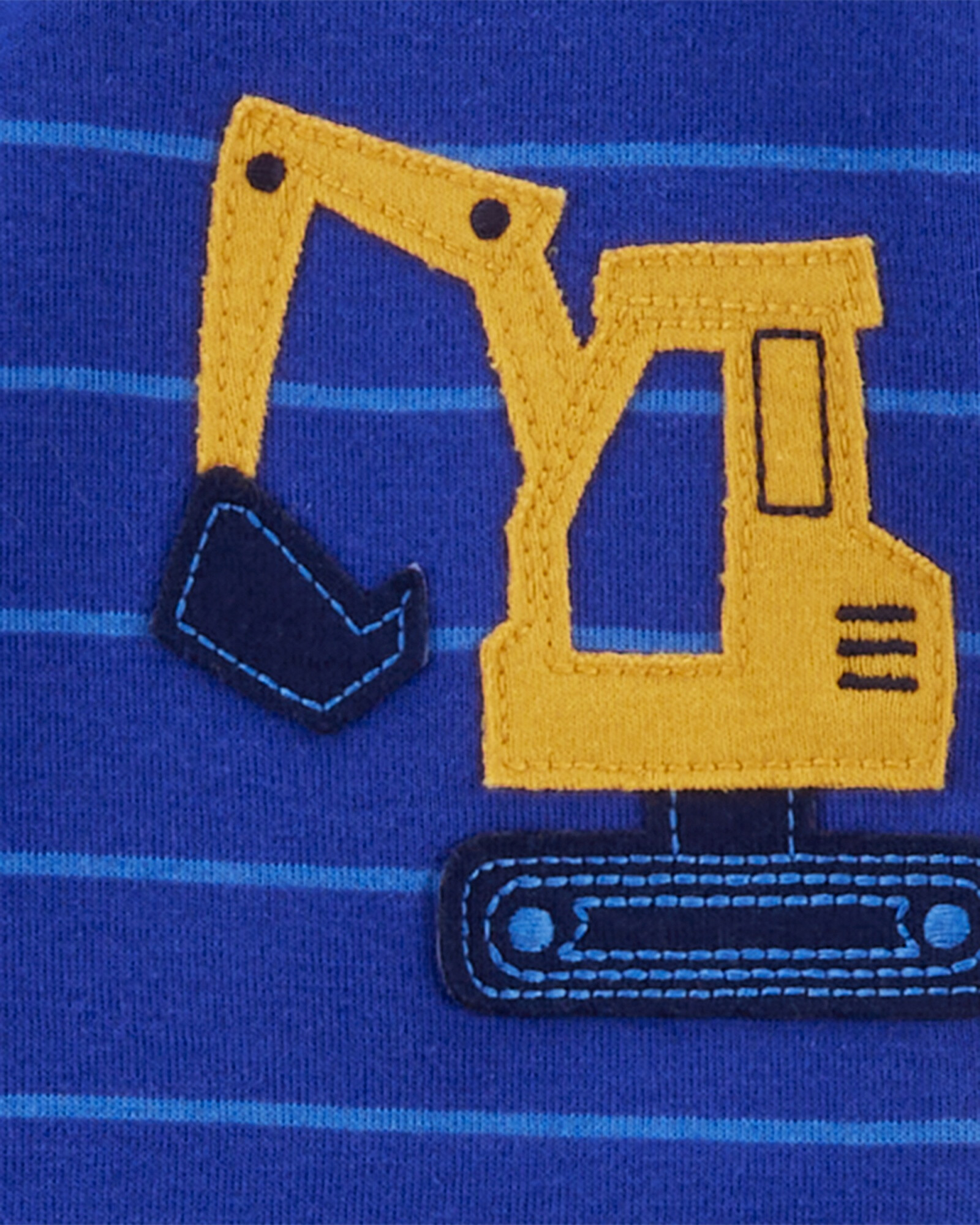 Pijama una pieza de algodón, con pie, azul, estampa constructor. Talles 12-24M Pijama una pieza de algodón, con pie, azul, estampa constructor. Talles 12-24M