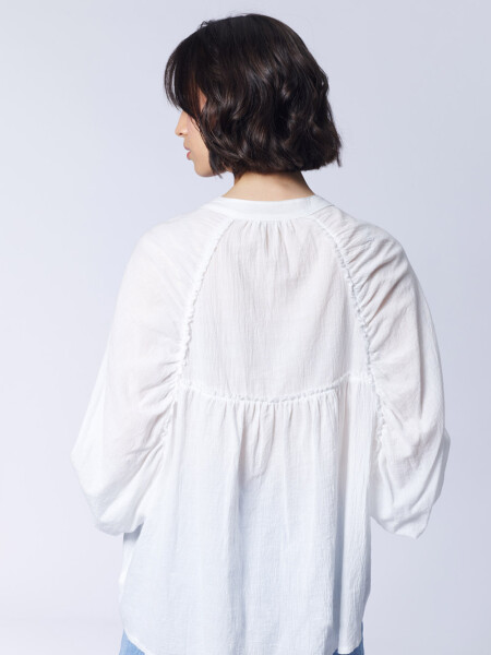 Blusa Cortes Cruda