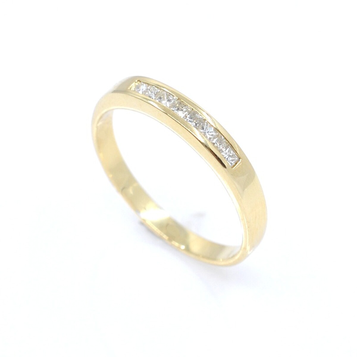 Anillo medio sin fin en oro 18k con 8 brillantes tallado princesa 