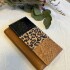 Billetera Lirio Negro, animal print y beige