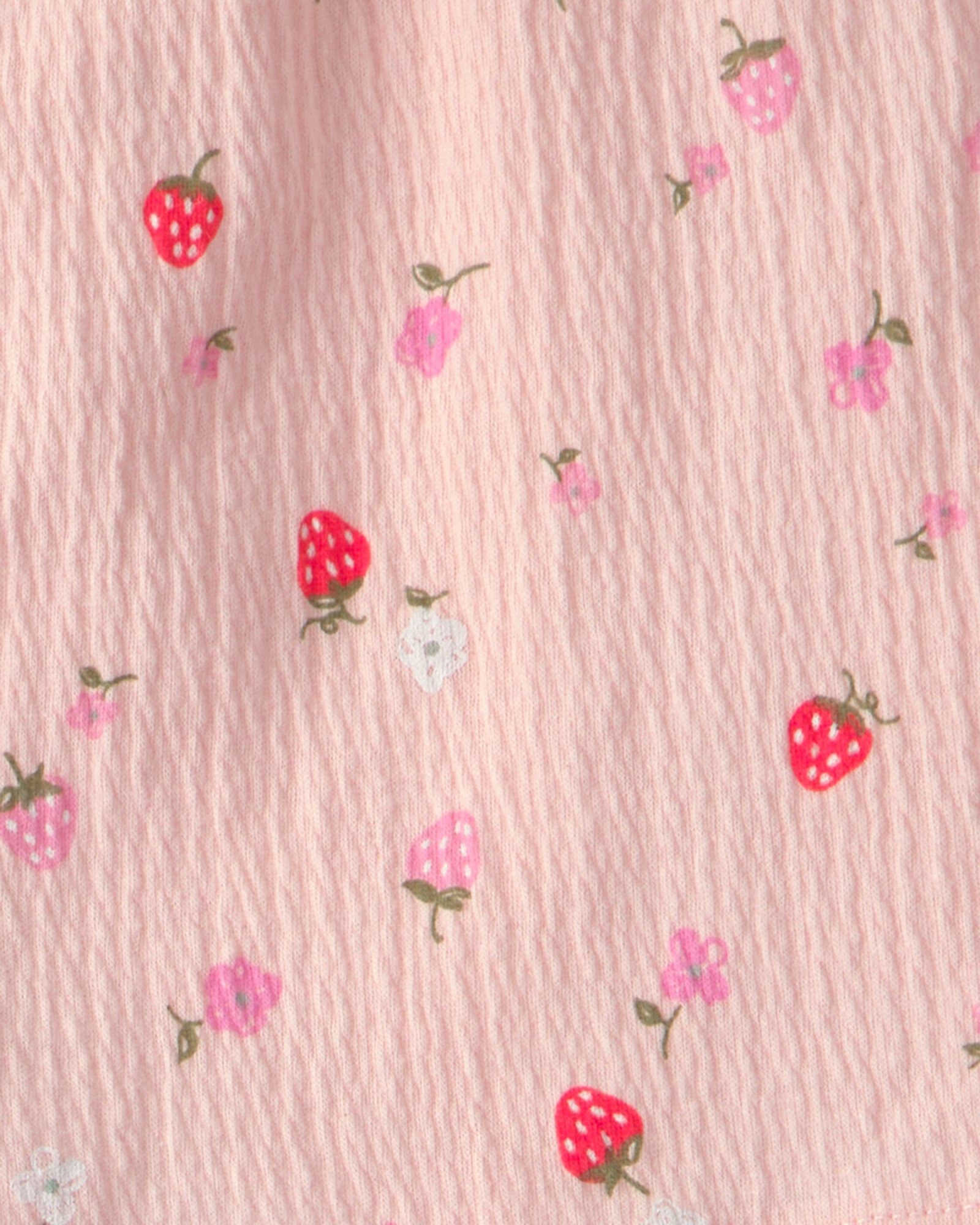 Set dos piezas de jersey arrugado, short pollera y remera, rosado, diseño frutillas. Talles 2-5T Sin color