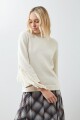 Sweater con flecos beige claro