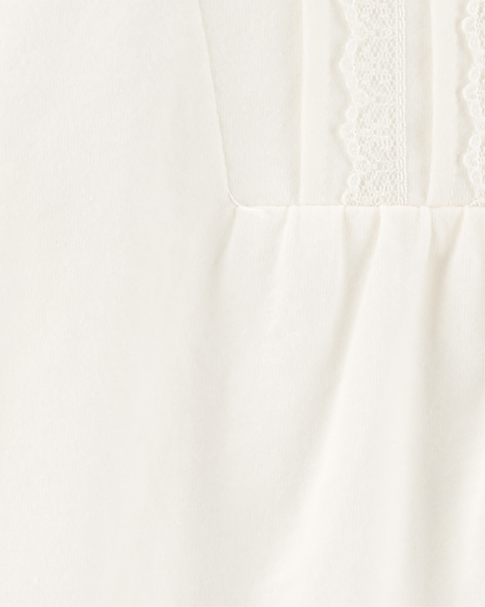 Blusa de algodón manga corta con botones y detalle de encaje Sin color