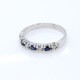 Anillo en oro 18k blanco, brillantes y zafiros. Anillo en oro 18k blanco, brillantes y zafiros.