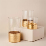 FLORERO VIDRIO TRANS. D10x15CM DORADO FLORERO VIDRIO TRANS. D10x15CM DORADO