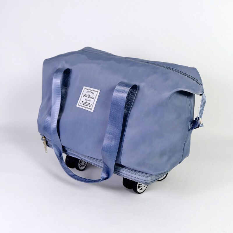BOLSO AZUL P/VIAJE C/RUEDITAS 39X20X34CM Unica