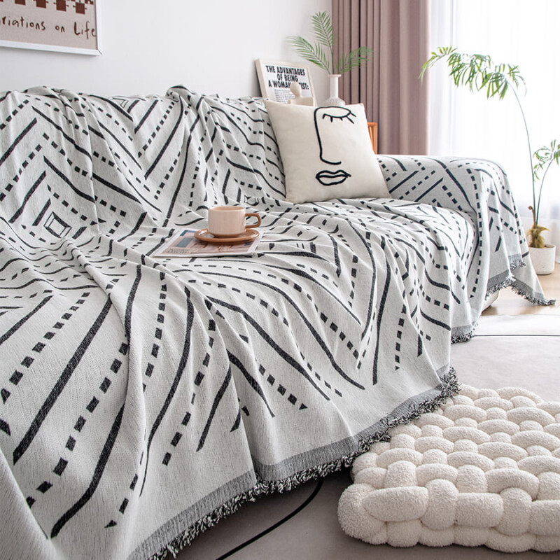 Manta sillon y cama punteada 180x300cm gris