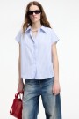 CAMISA SIN MANGAS Celeste