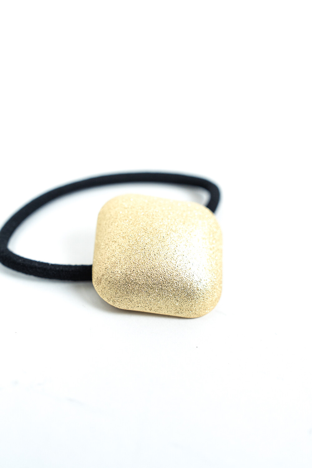 Gomita De Pelo Liorè Dorado
