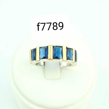 Anillo de Plata 925 con double de Oro 18k y Circonias azules. Anillo de Plata 925 con double de Oro 18k y Circonias azules.