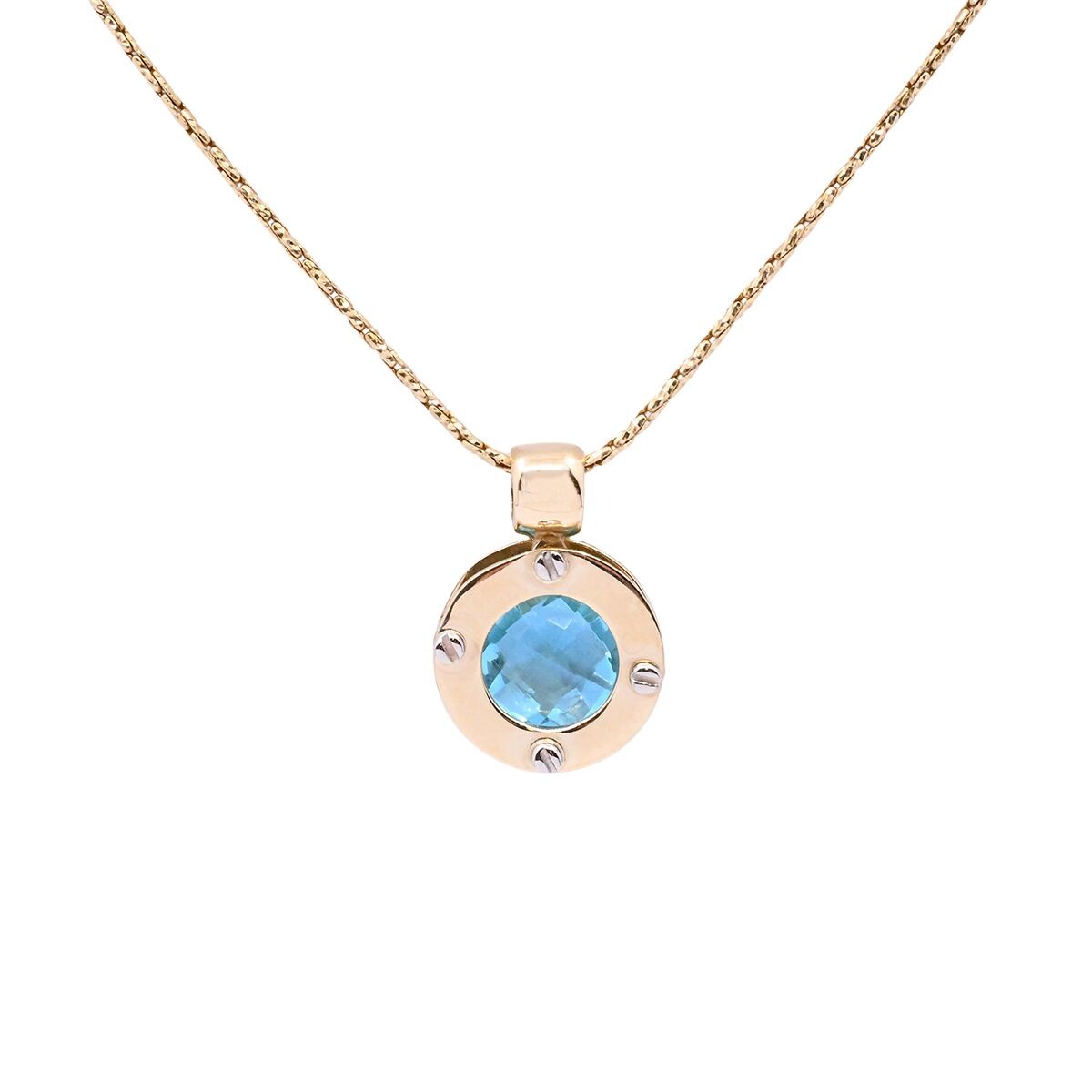 Colgante oro 18k 2 tonos con topacio azul. 