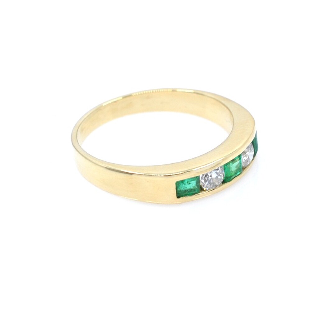 Anillo en oro 18k con esmeraldas y brillantes Anillo en oro 18k con esmeraldas y brillantes