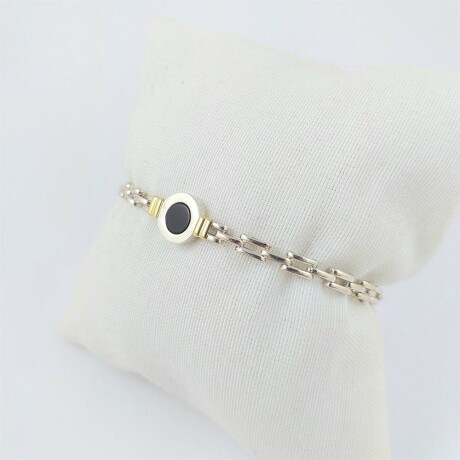 Pulsera de plata 925 panther con detalle de double oro 18Ktes, piedra ónix central 1cm, ancho eslabón 4mm, largo 18cm. Pulsera de plata 925 panther con detalle de double oro 18Ktes, piedra ónix central 1cm, ancho eslabón 4mm, largo 18cm.