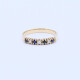 Anillo medio sin fin oro 18k amarillo con 4 zafiros y 3 brillantes. Anillo medio sin fin oro 18k amarillo con 4 zafiros y 3 brillantes.