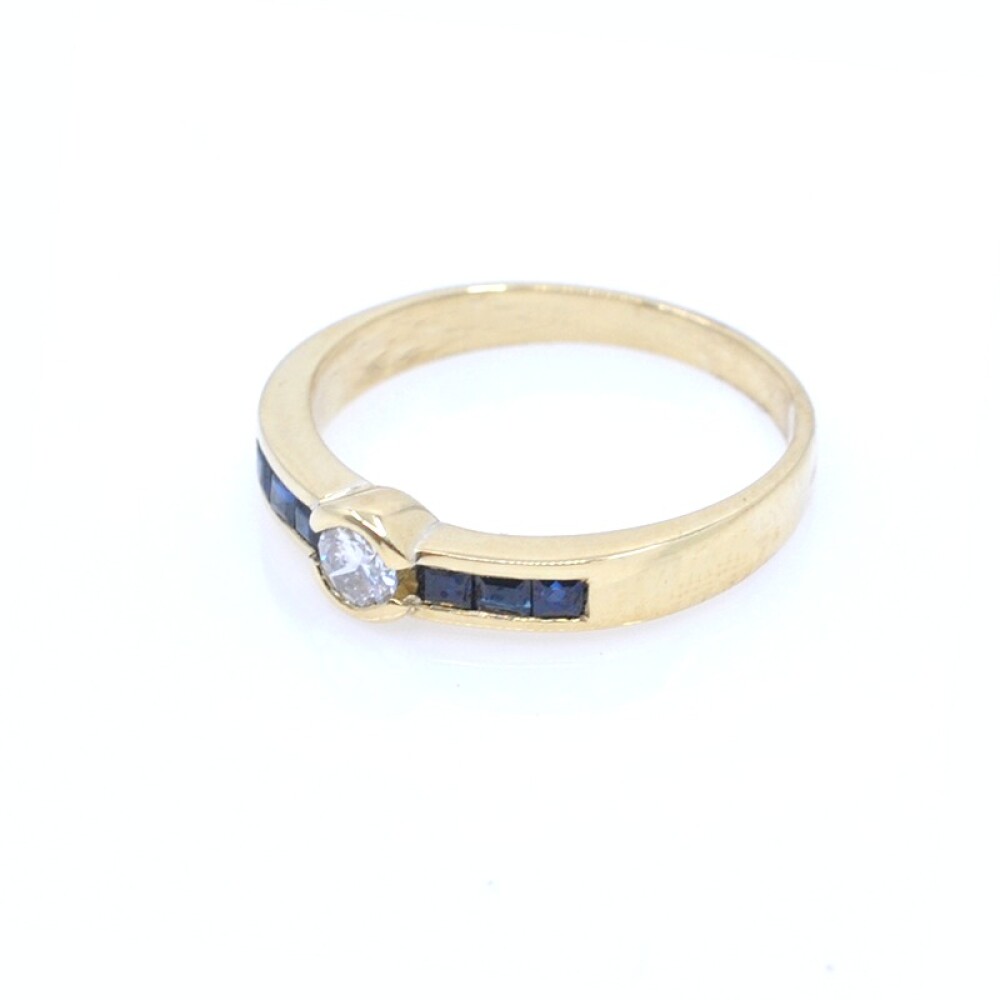 Anillo en oro 18k , brillante y zafiros Anillo en oro 18k , brillante y zafiros