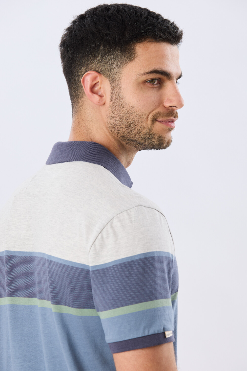 REMERA POLO RAYADA JERSEY Gris