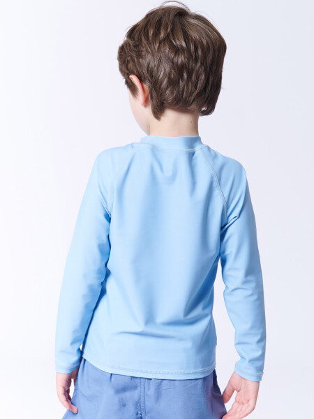Remera manga larga uv Surf Break Celeste