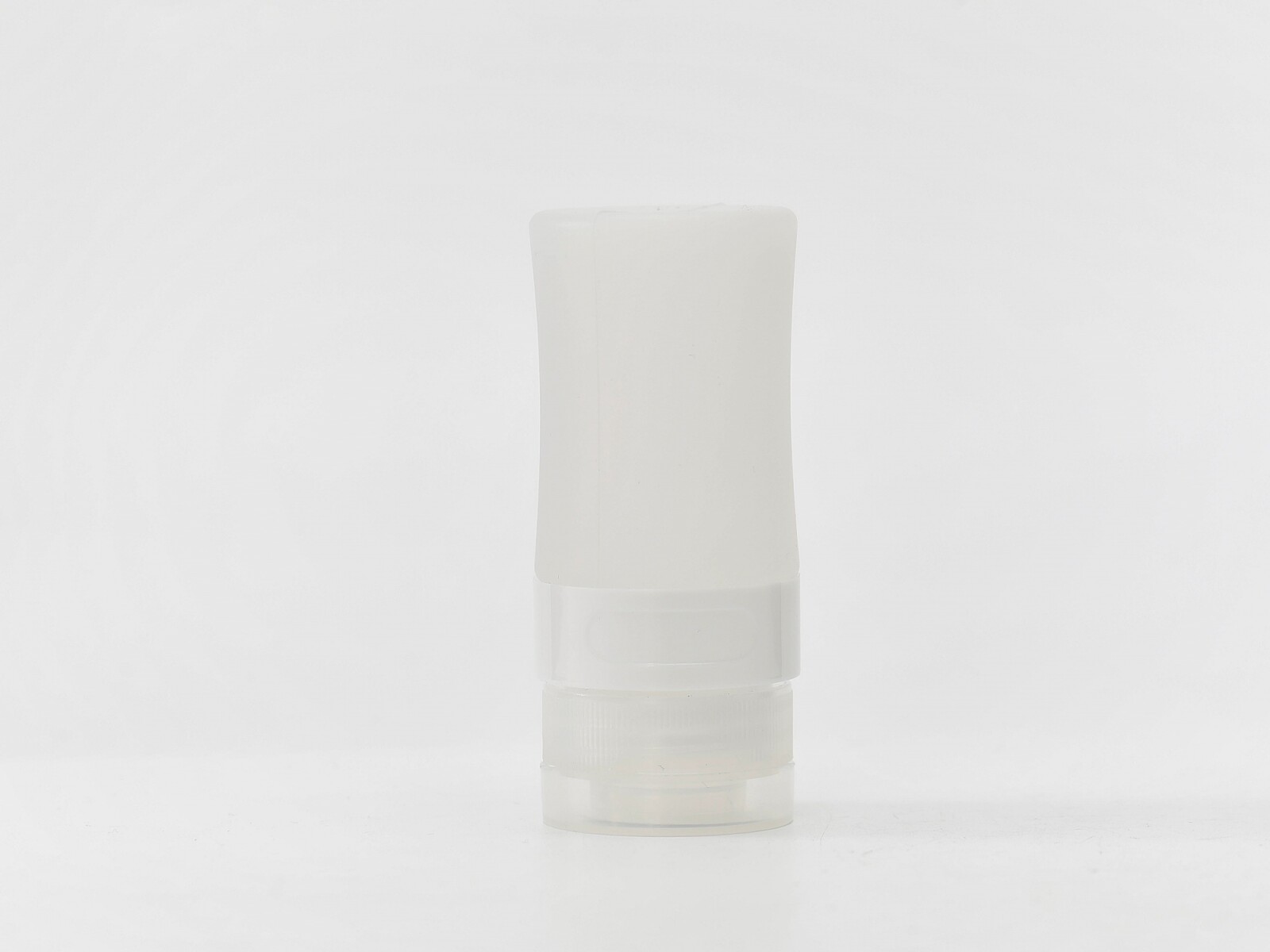 BOTELLA DE VIAJE CILÍNDRICA DE SILICONA - 38 ML 