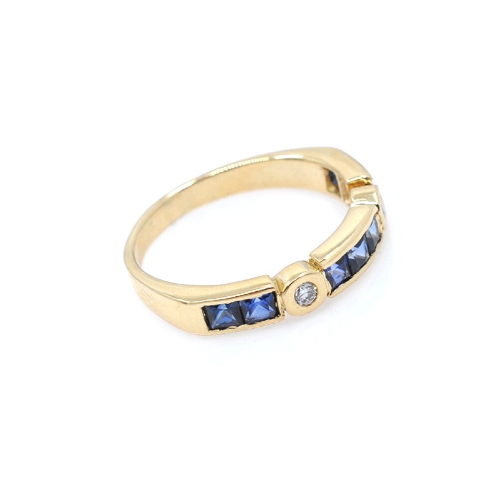 Anillo en oro 18k con zafiros azules carré y 2 brillantes Anillo en oro 18k con zafiros azules carré y 2 brillantes