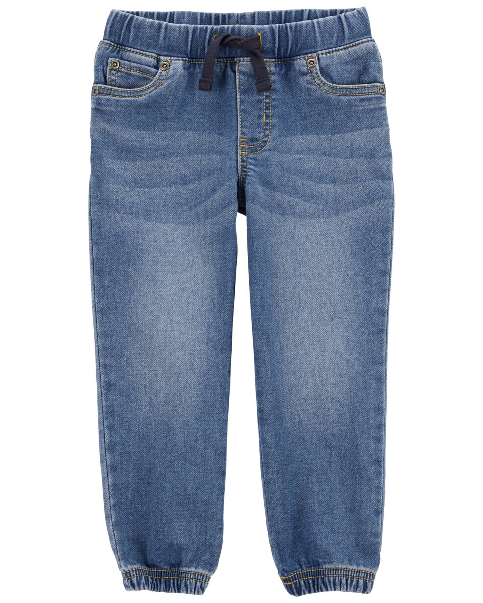 Pantalón jean con puño ceñido 