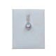 Colgante en oro 18k blanco con perla gris y brillantes Colgante en oro 18k blanco con perla gris y brillantes