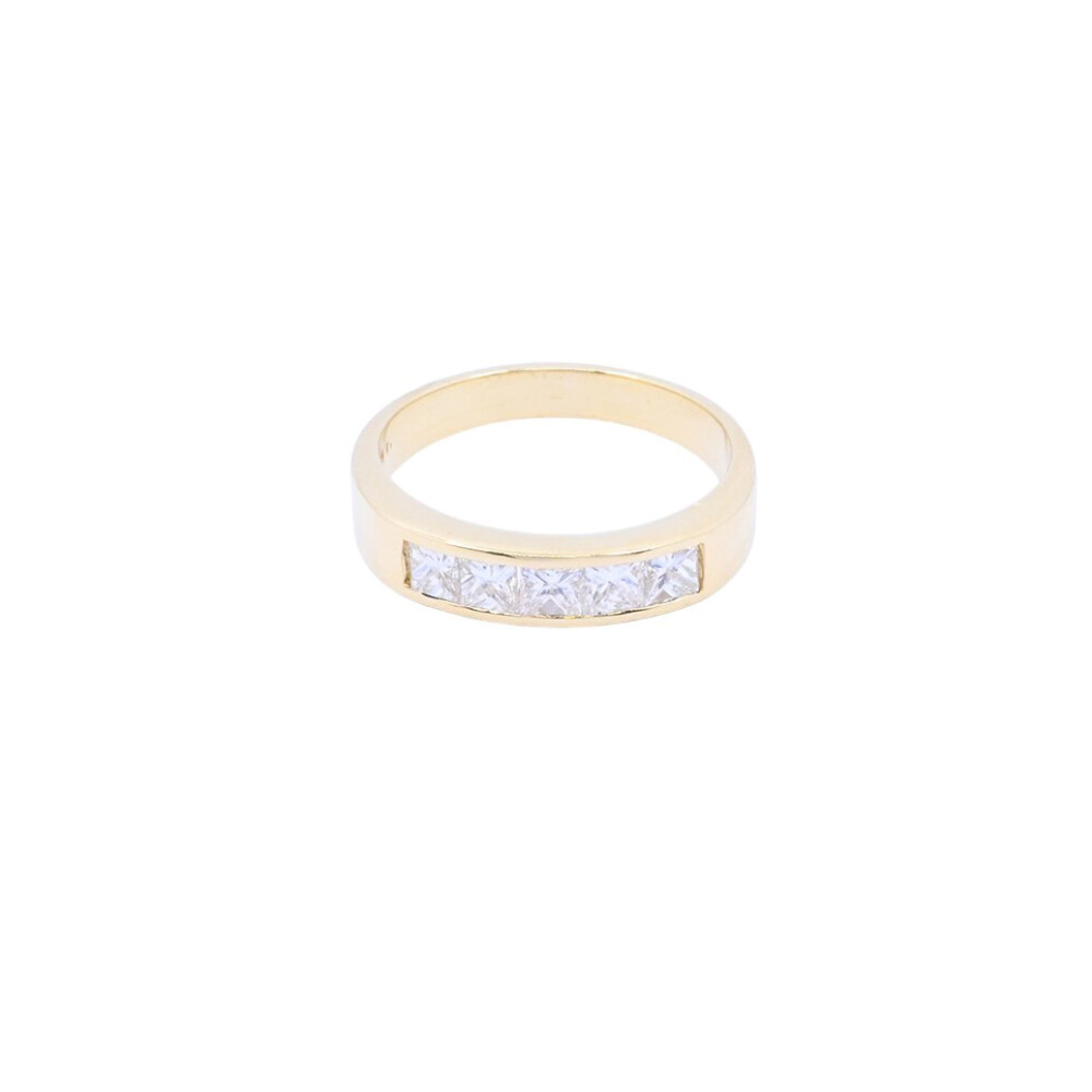 Anillo medio sin fin oro 18k amarillo carril con 5 brillantes princesa. Anillo medio sin fin oro 18k amarillo carril con 5 brillantes princesa.
