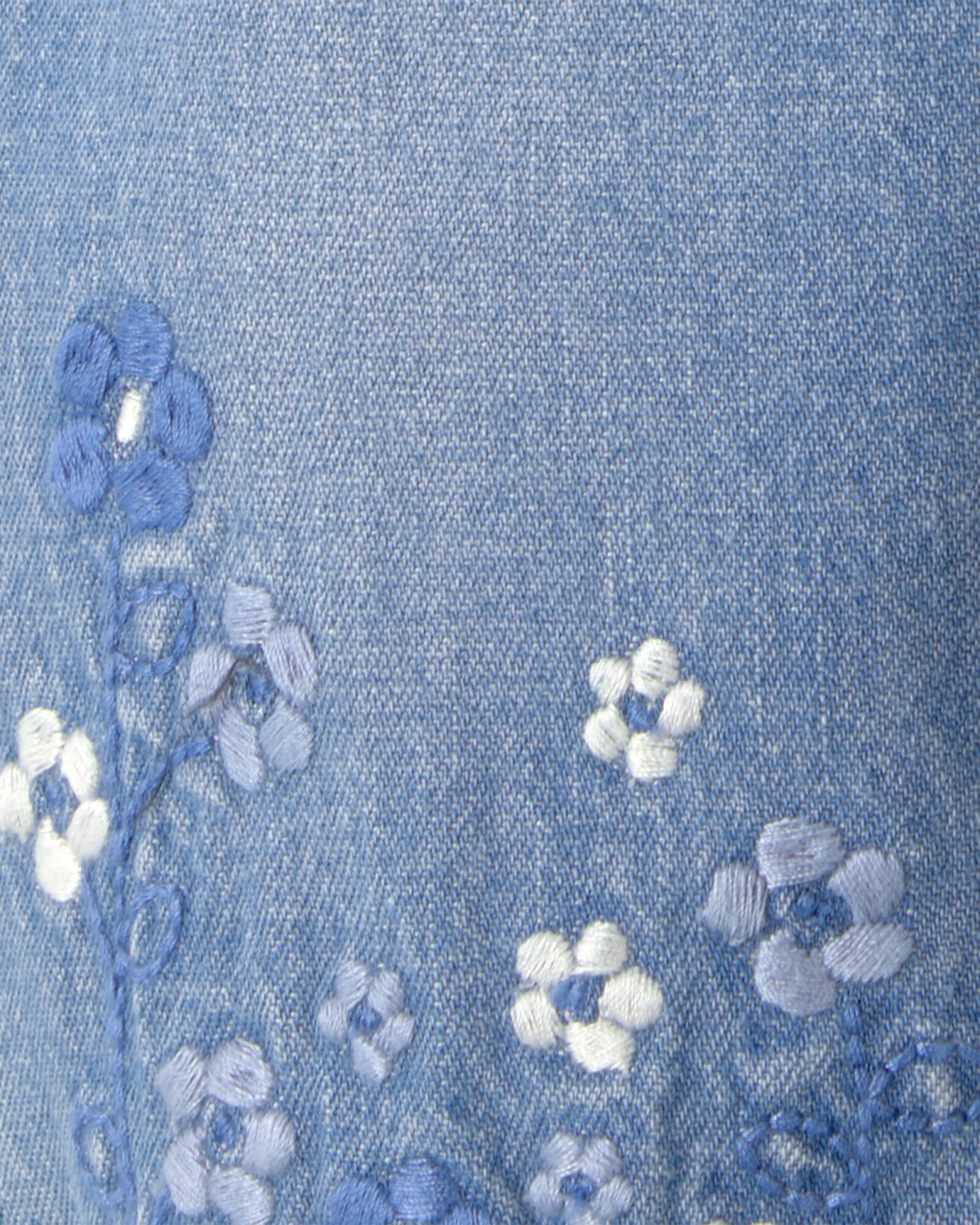 Pantalón jean con bordado floral Sin color