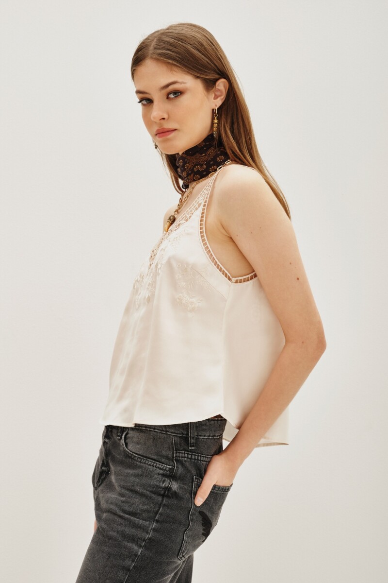 Top Helene Crudo