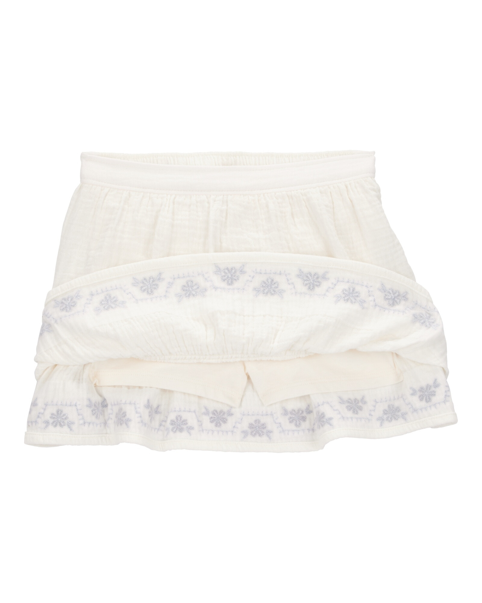 Pollera short de gasa, con bordado floral Pollera short de gasa, con bordado floral