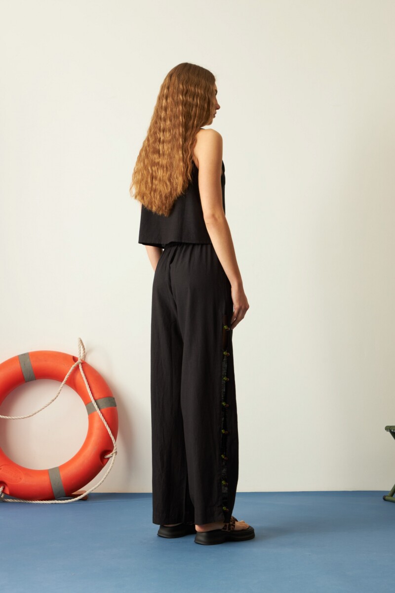Pantalón con piedras negro