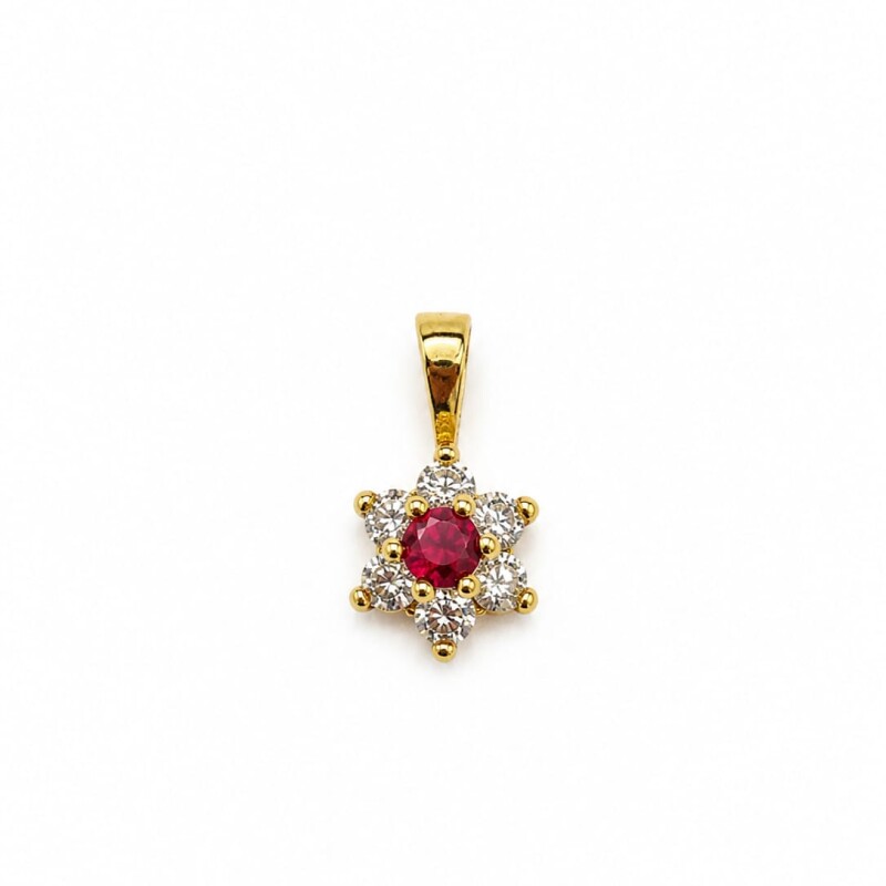 Colgante flor en oro 18kt con Rubi Colgante flor en oro 18kt con Rubi
