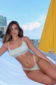 KATE COLALESS FLORES