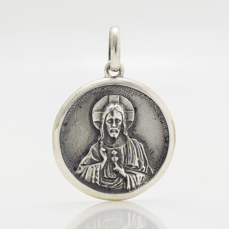 Medalla religiosa sagrado corazón con borde de plata 900, 3cm. Medalla religiosa sagrado corazón con borde de plata 900, 3cm.