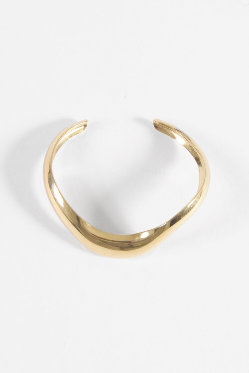 Pulsera rígida wavy acero dorado