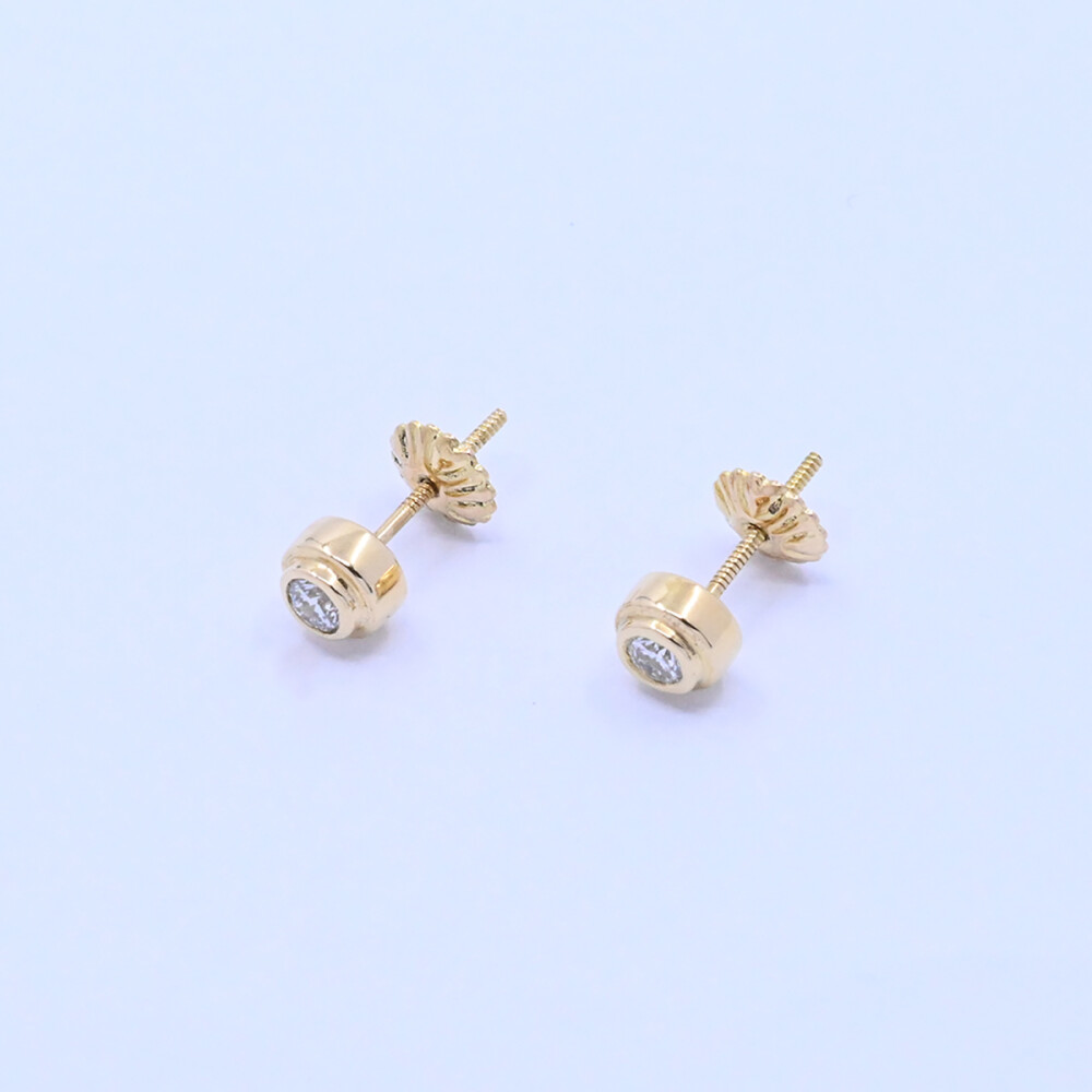Caravanas oro18k y brillantes. Caravanas oro18k y brillantes.