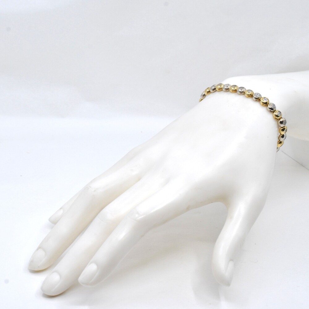 Pulsera en oro 18k de 2 colores y brillantes Pulsera en oro 18k de 2 colores y brillantes