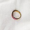 Anillo Medio Sin Fin en 18k con rubies Anillo Medio Sin Fin en 18k con rubies