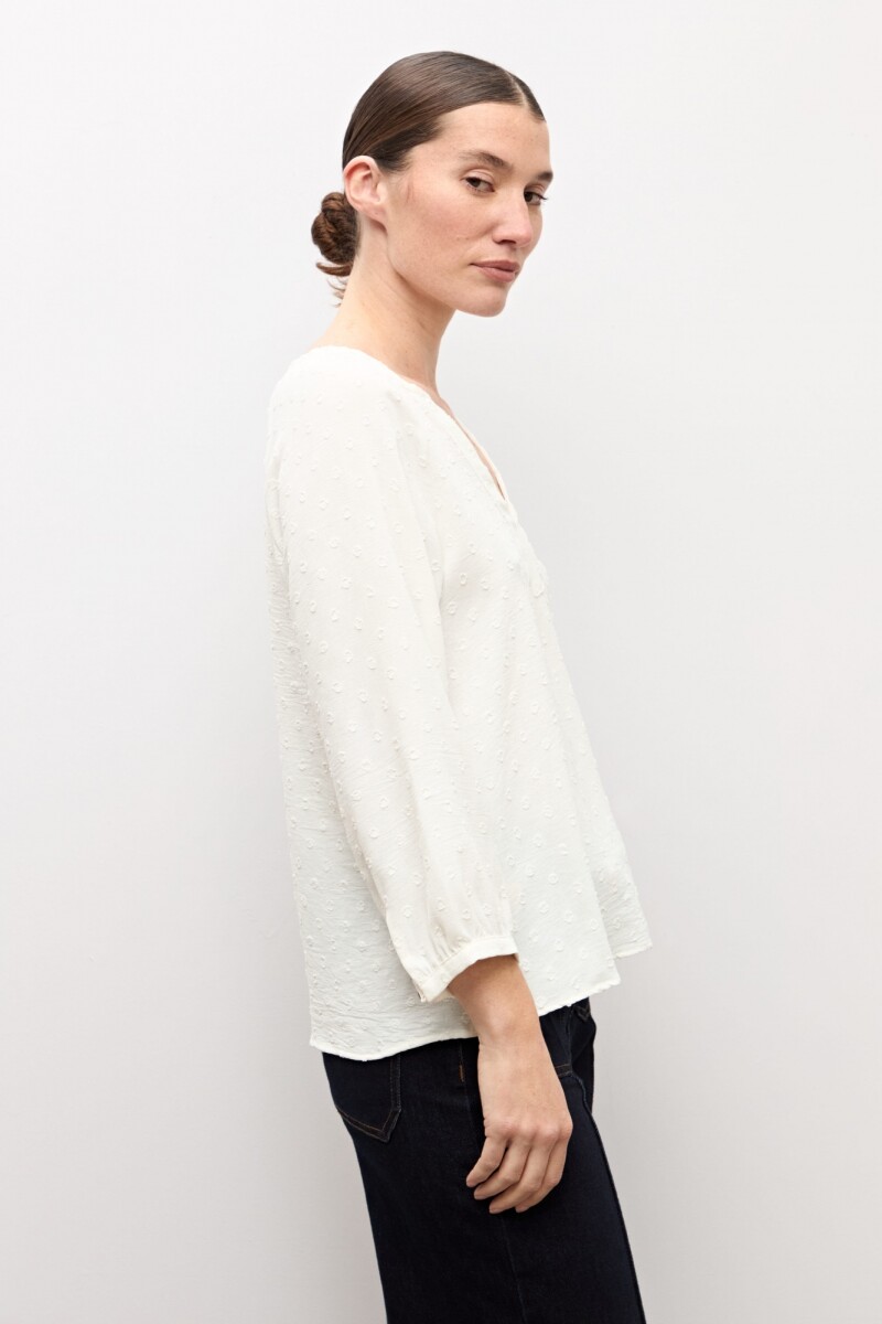 Blusa plumeti escote V crudo