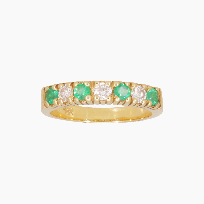Anillo en Oro 18K con Esmeraldas Diseño Medio Sin Fin Anillo En Oro 18k Con Esmeraldas Diseño Medio Sin Fin
