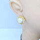 Caravanas clips en oro 14k con perlas mabe y brillantes Caravanas clips en oro 14k con perlas mabe y brillantes