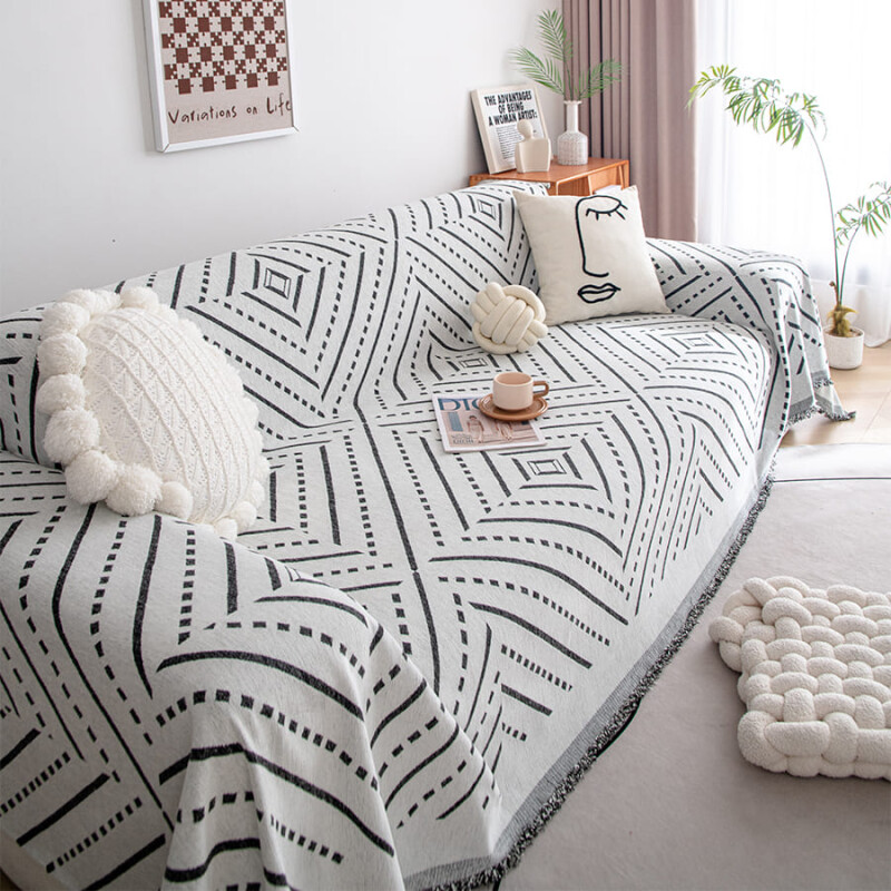 Manta sillon y cama punteada 180x300cm gris