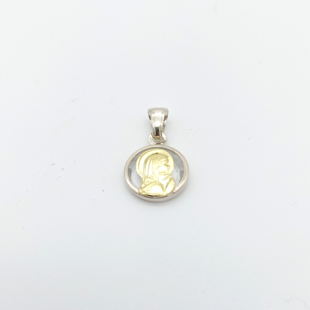Medalla religiosa de plata 925, Virgen Niña cristal con manto, detalles de double en oro 18Ktes, diámetro 12mm. 