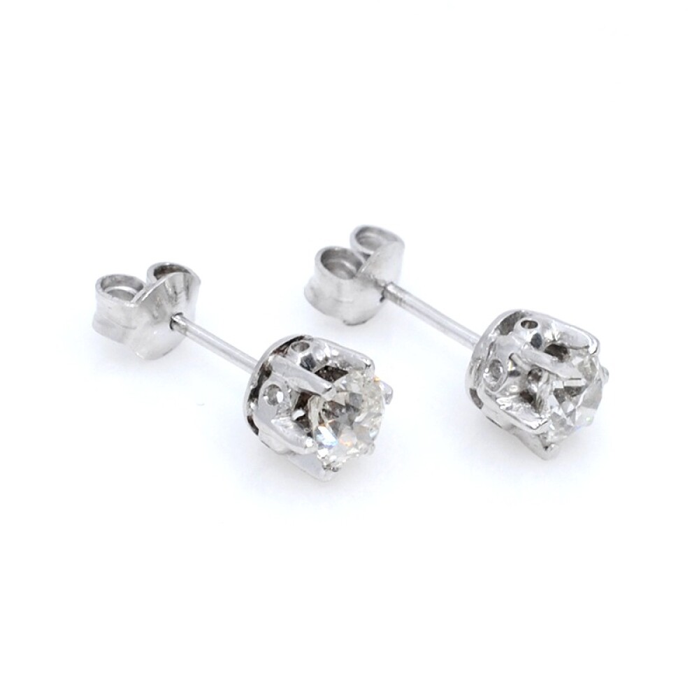 Caravanas en oro 18k blanco y brillantes. Caravanas en oro 18k blanco y brillantes.