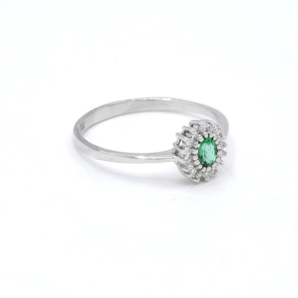 Ring In 18K White Gold, Diamonds And Emerald Ring In 18K White Gold, Diamonds And Emerald