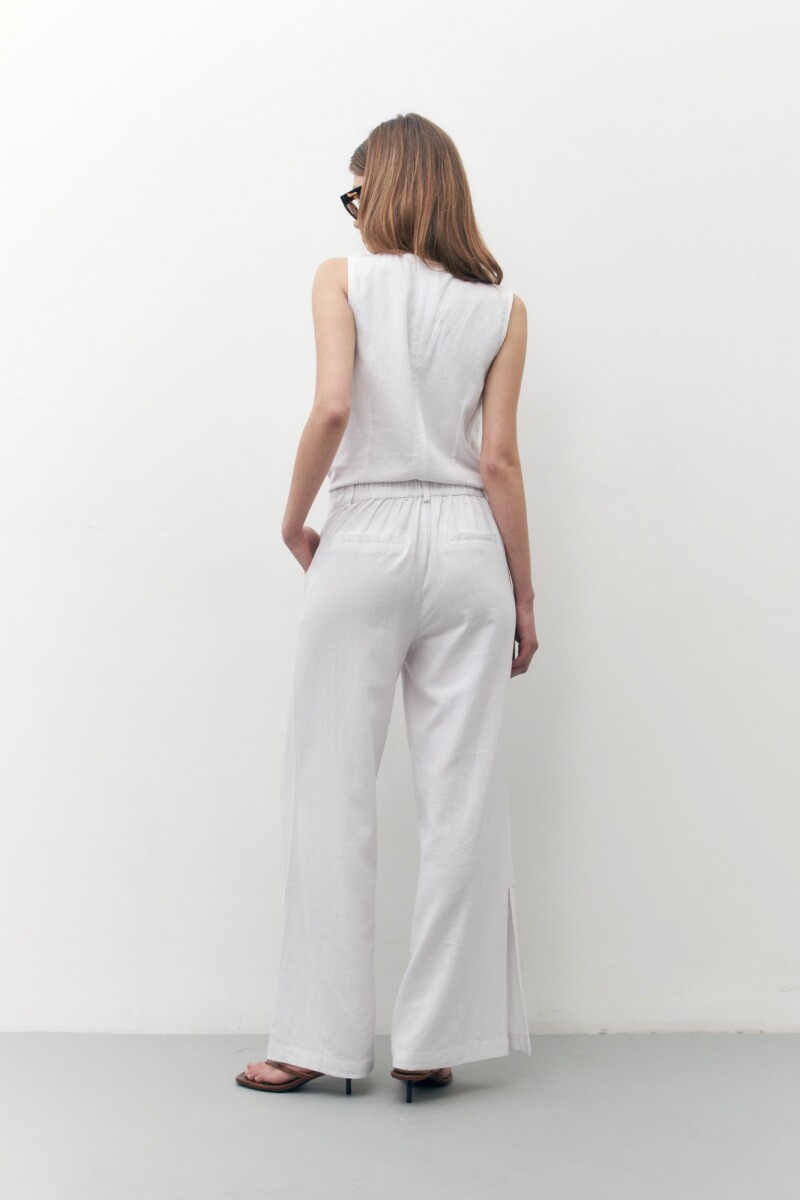 Pantalón ancho de lino con tajo blanco