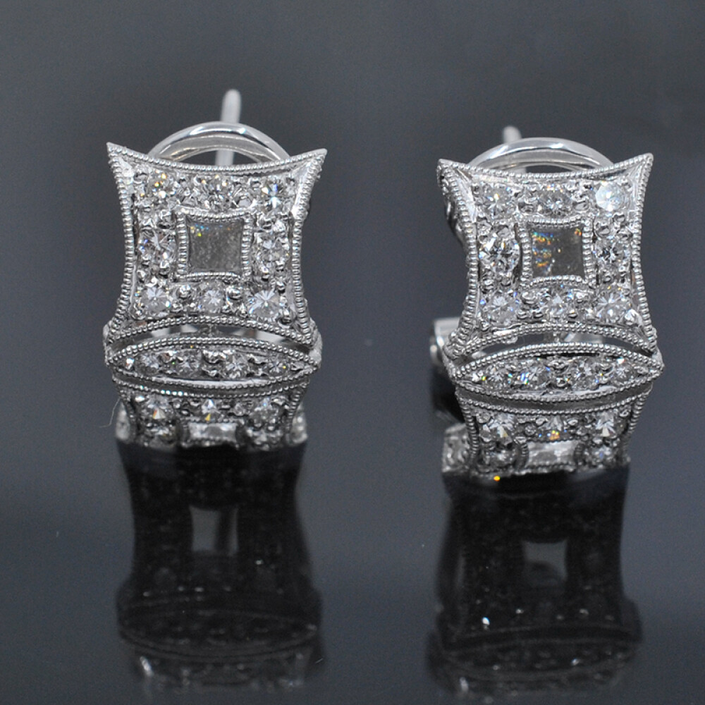 Caravanas clips 18k en oro blanco con brillantes Caravanas clips 18k en oro blanco con brillantes
